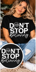 Don't Stop Believing – Black Christmas T-Shirt approved model mockup with circular design inset